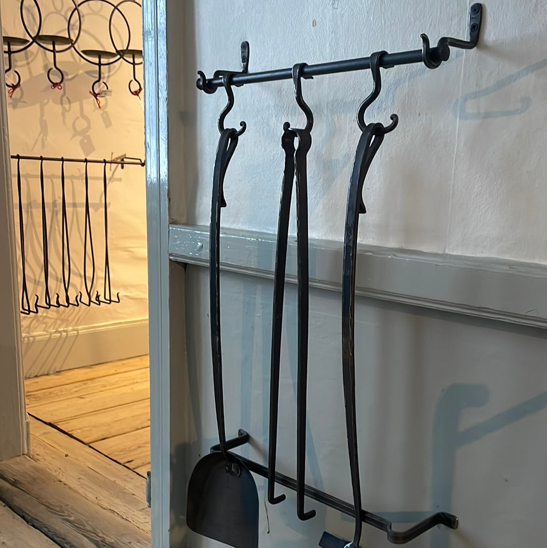 a glass vase sitting on top of a table