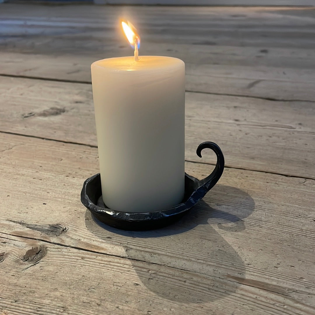 a coffee cup sitting on top of a table 