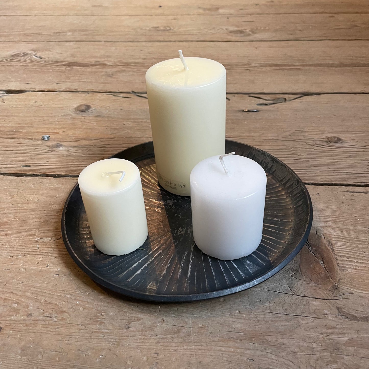 a close up of a cup of milk next to a cupcake