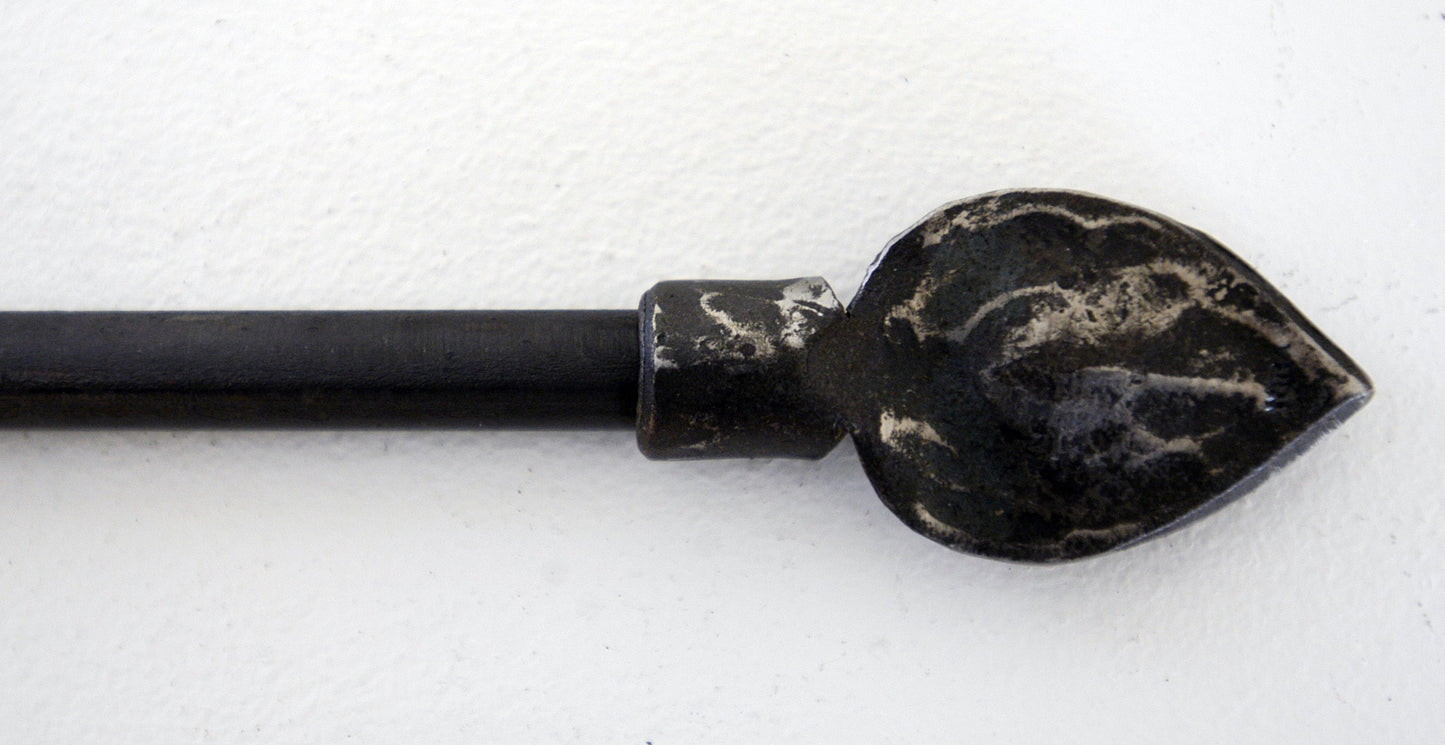 a pair of black scissors laying on a table