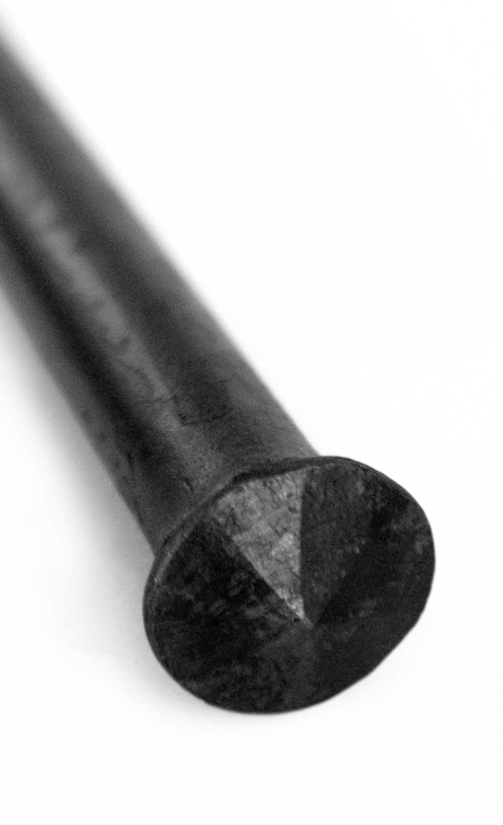 a black and white photo of a pair of scissors