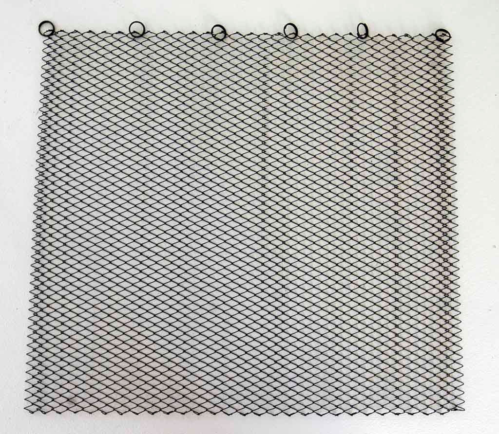 a black and white photo of birds flying in the sky