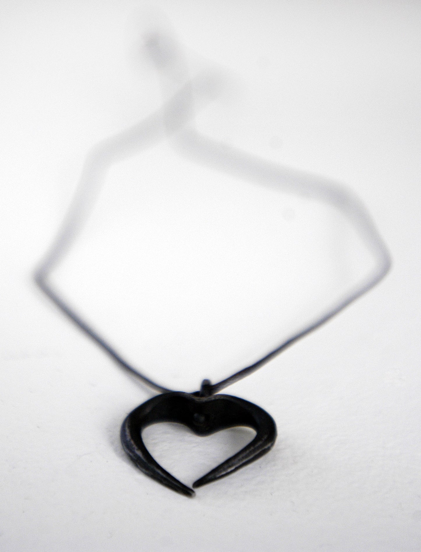 a pair of scissors on a white surface