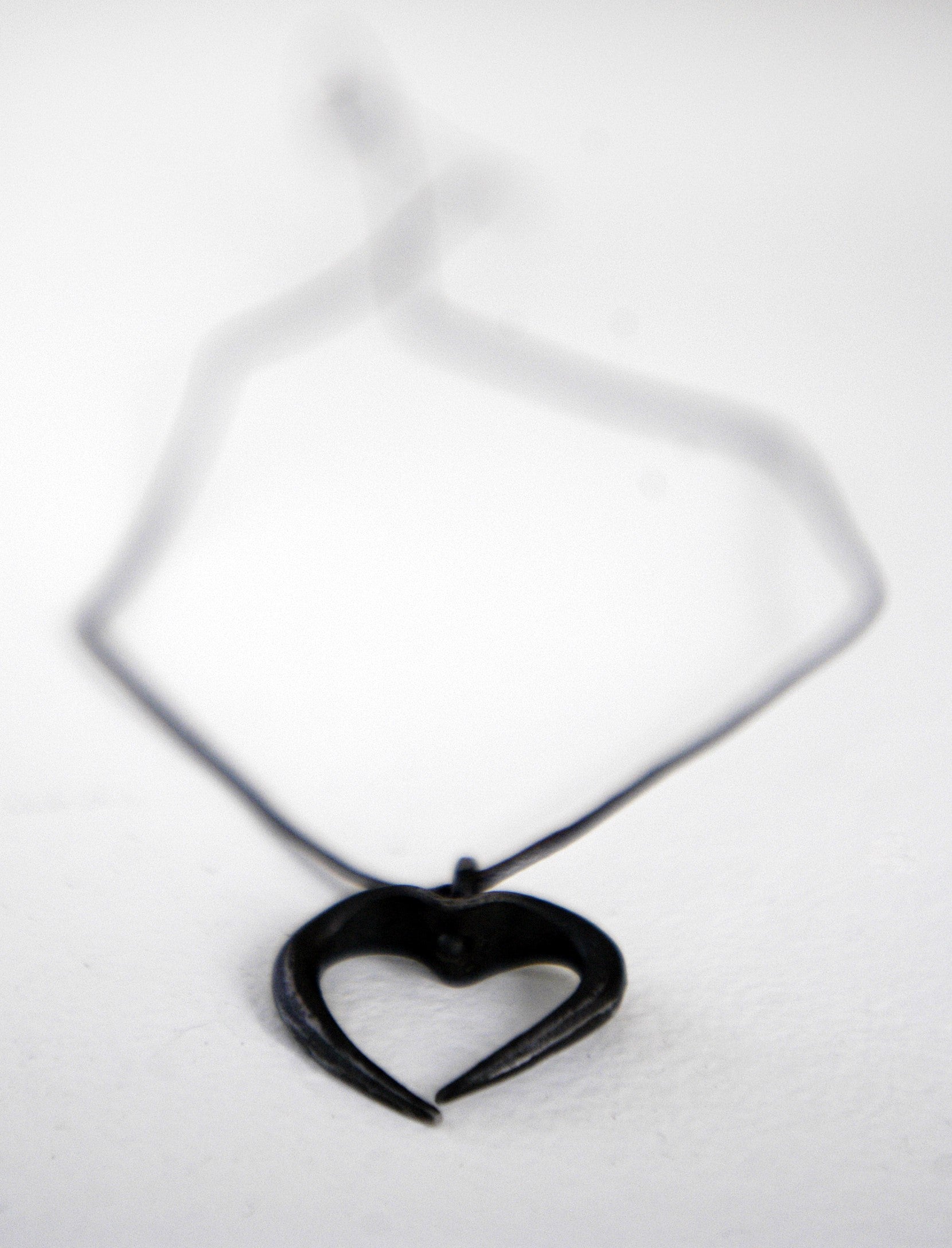 a pair of scissors on a white surface