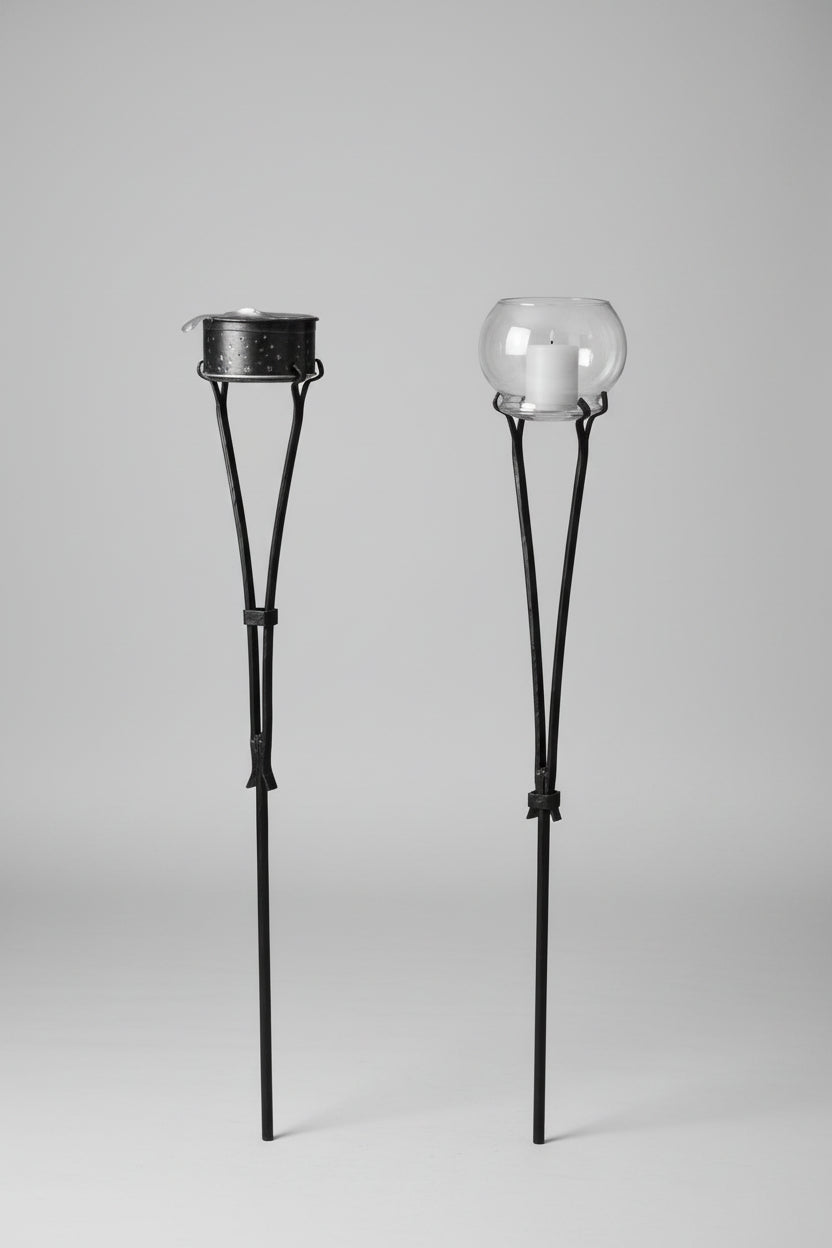 a couple of umbrellas that are in the grass