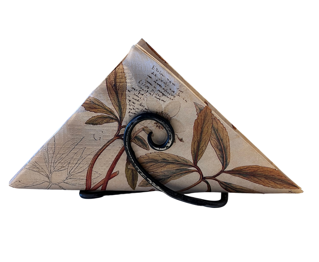 a pair of scissors sitting on top of a piece of paper