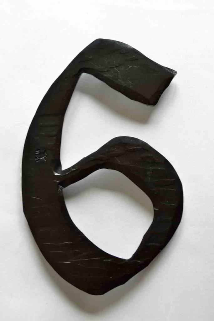 a close up of a pair of black scissors 