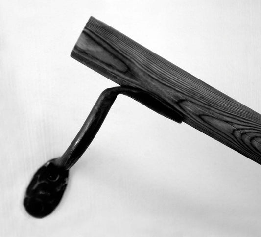 a black and white photo of a street sign