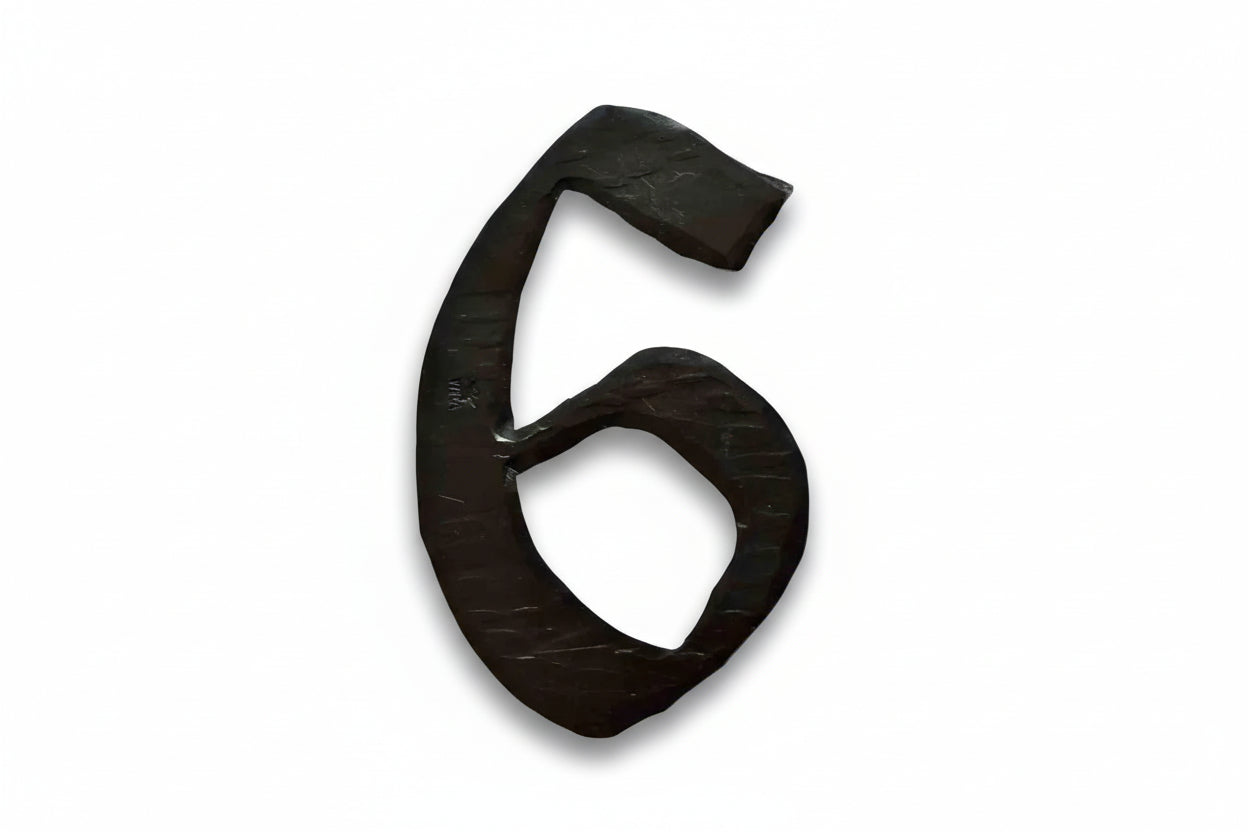 a close up of a pair of black scissors 